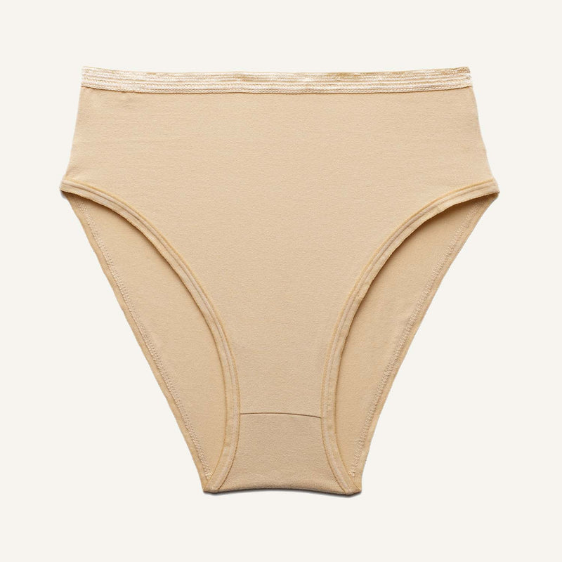 A high rise brief in wheat beige color.