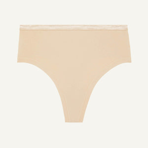A high rise thong in wheat beige color.