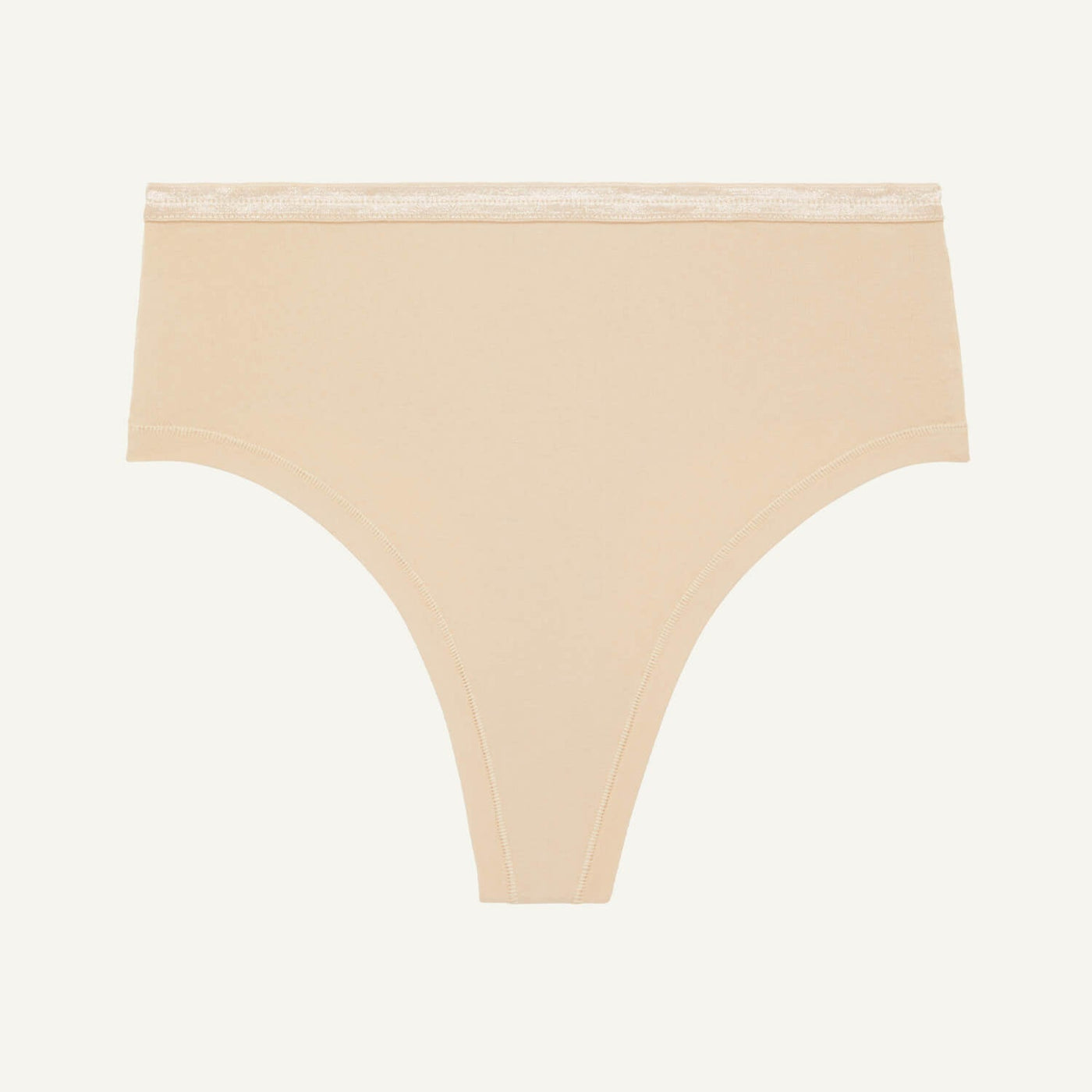 A high rise thong in wheat beige color.