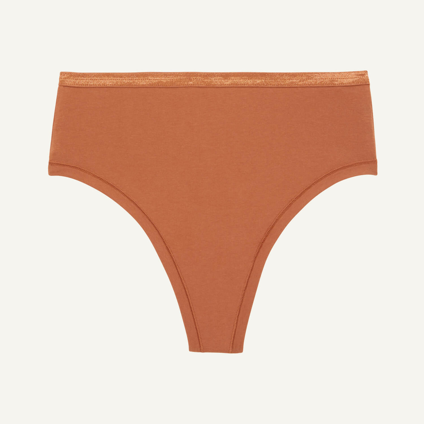 A high rise thong in spice brown color.