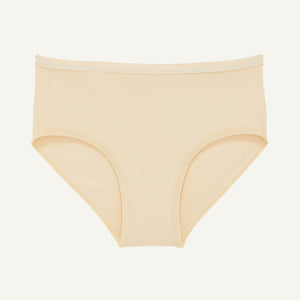 A mid rise brief in wheat beige color.