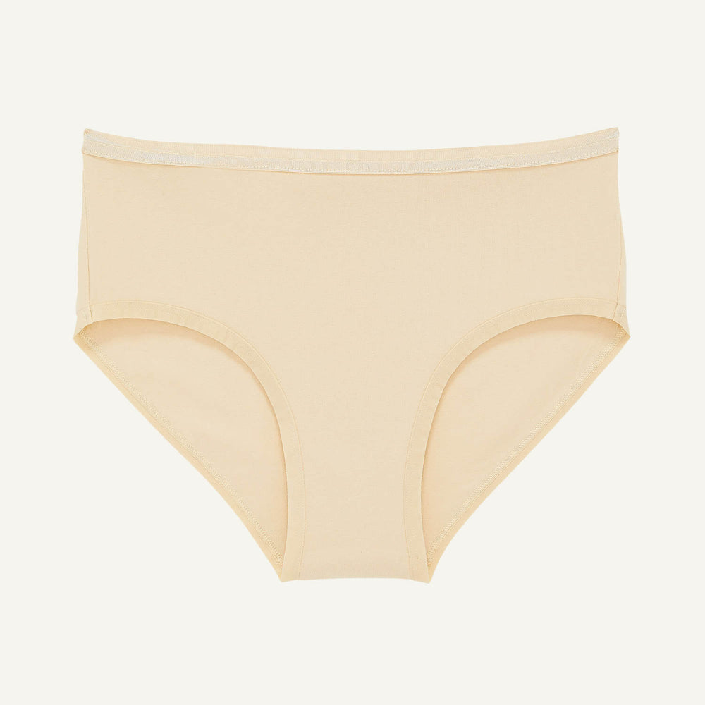 A mid rise brief in wheat beige color.