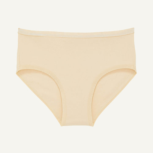A mid rise brief in wheat beige color.