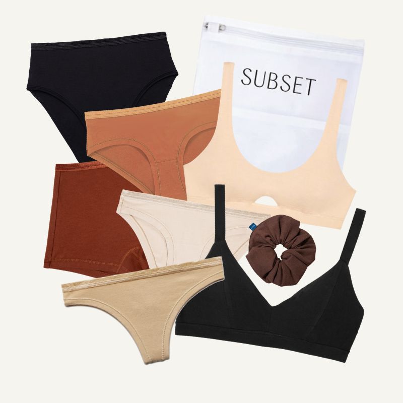 Collection of women's underwear and accessories on a white background
