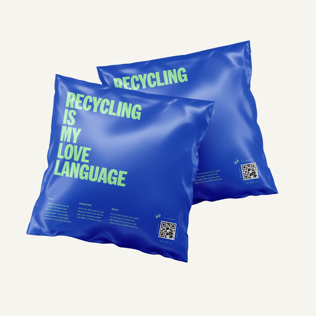 Two blue bags with the text 'RECYCLING IS MY LOVE LANGUANGE' printed in light green.